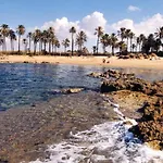 En Urbanizacion Con Piscina Y Jardin En 5 Minutos De La Playa דירה